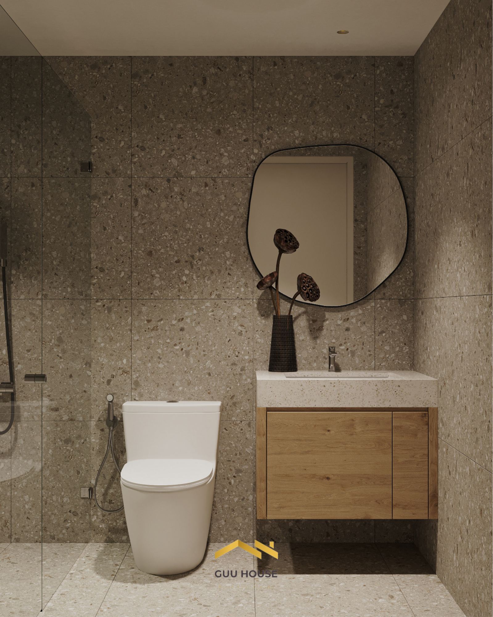 Phòng tắm hiện đại ốp đá terrazzo tông nâu ấm, lavabo tủ gỗ treo và gương bo cong tối giản